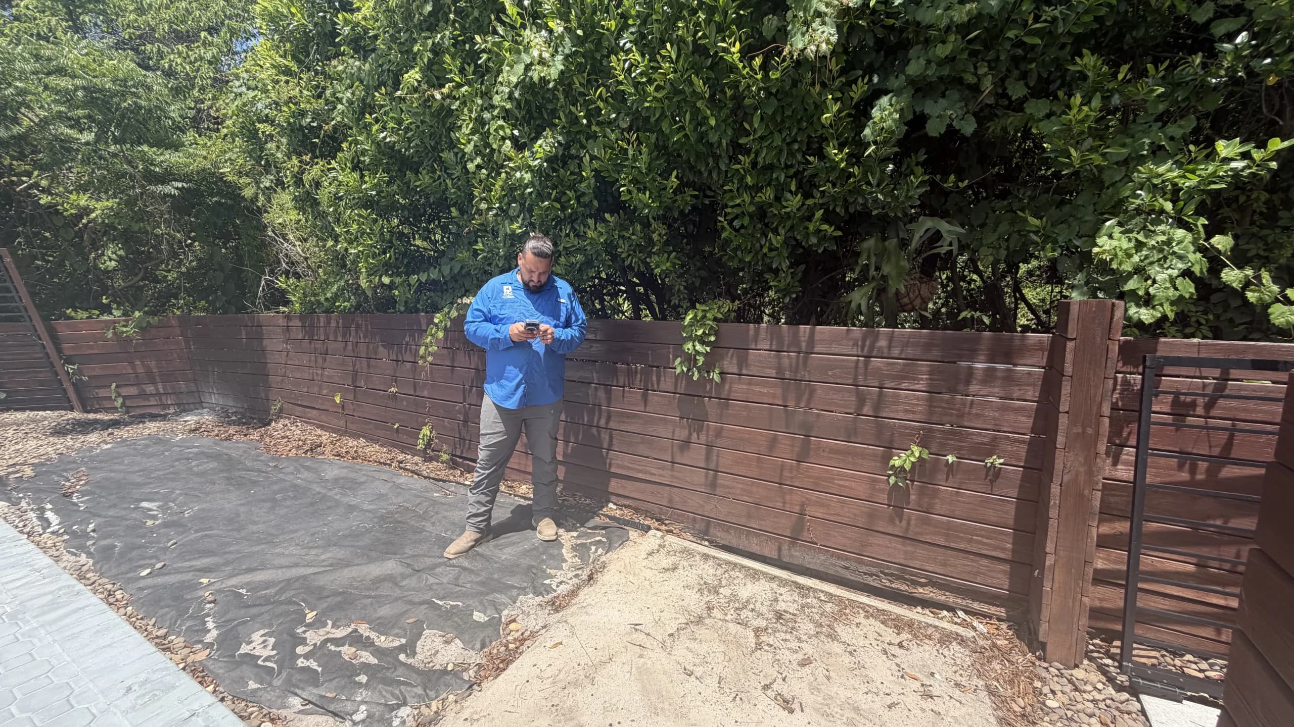 D&J The Pool Resurfacers reviewing HOA pool resurfacing documentation with Kissimmee Florida homeowner before project submission