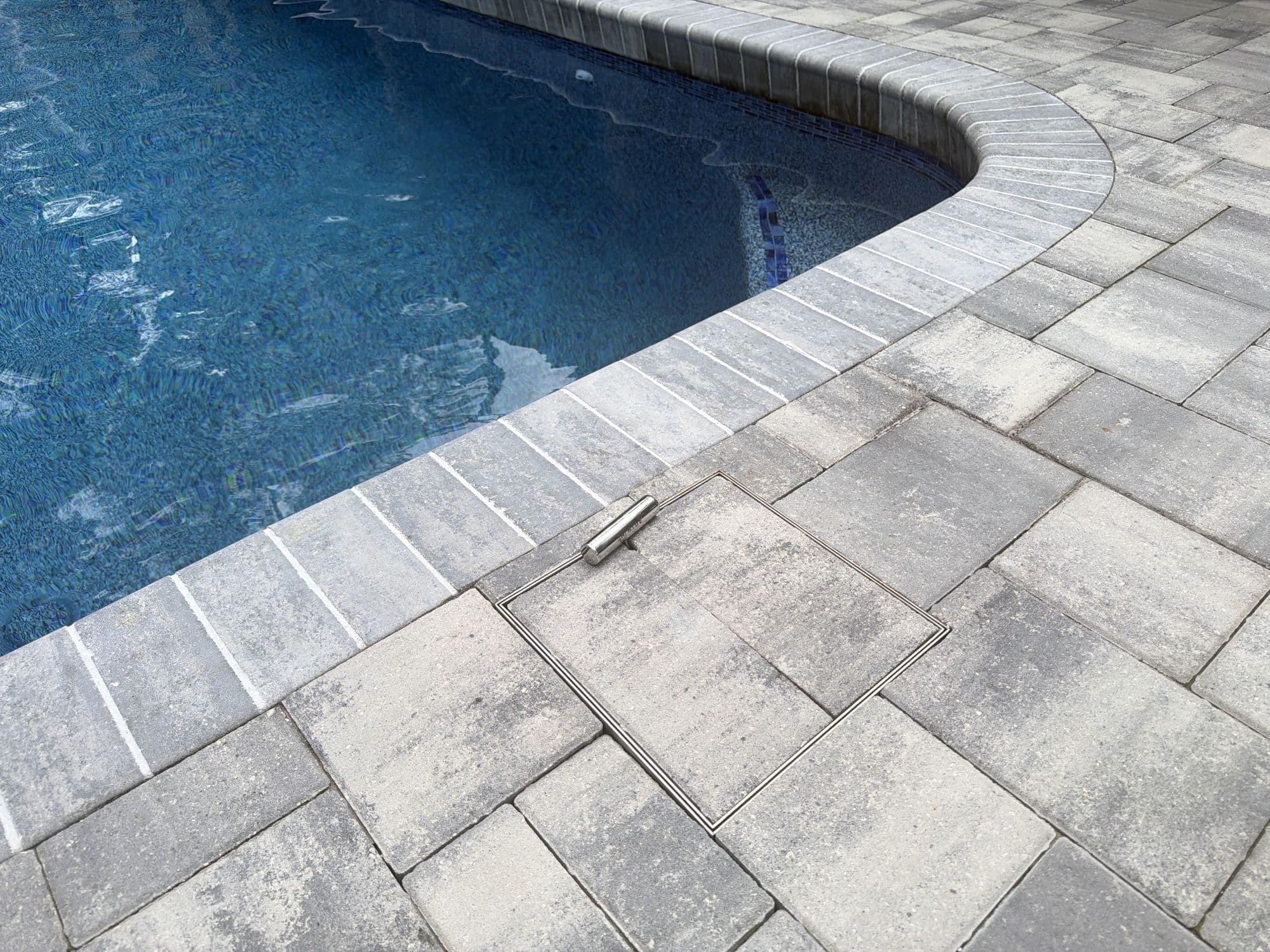 New paver deck and coping around a D&J pool