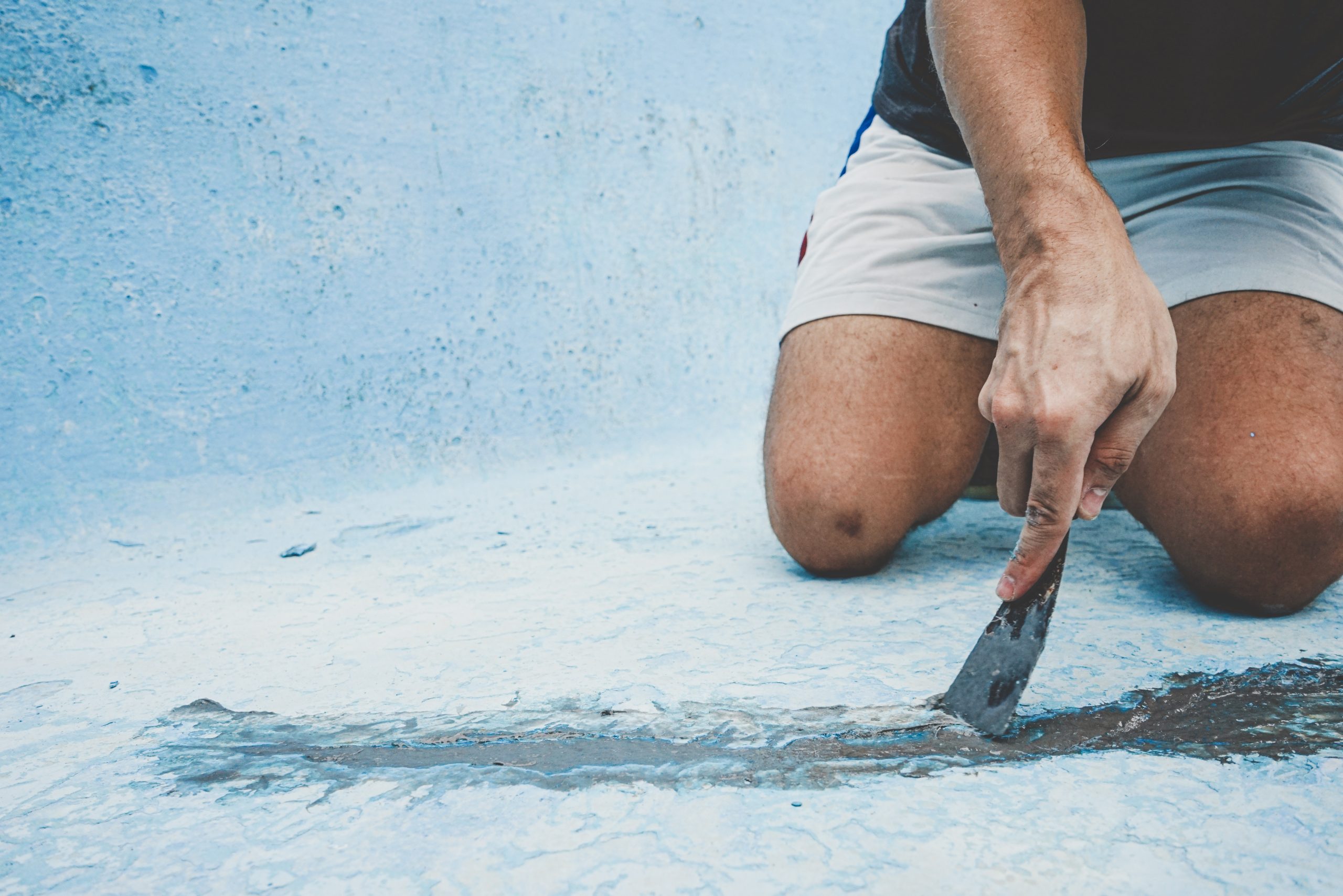 close up of a man fixing the floor of a pool 2026 01 05 05 49 17 utc close up of a man fixing the floor of a pool 2026 01 05 05 49 17 utc