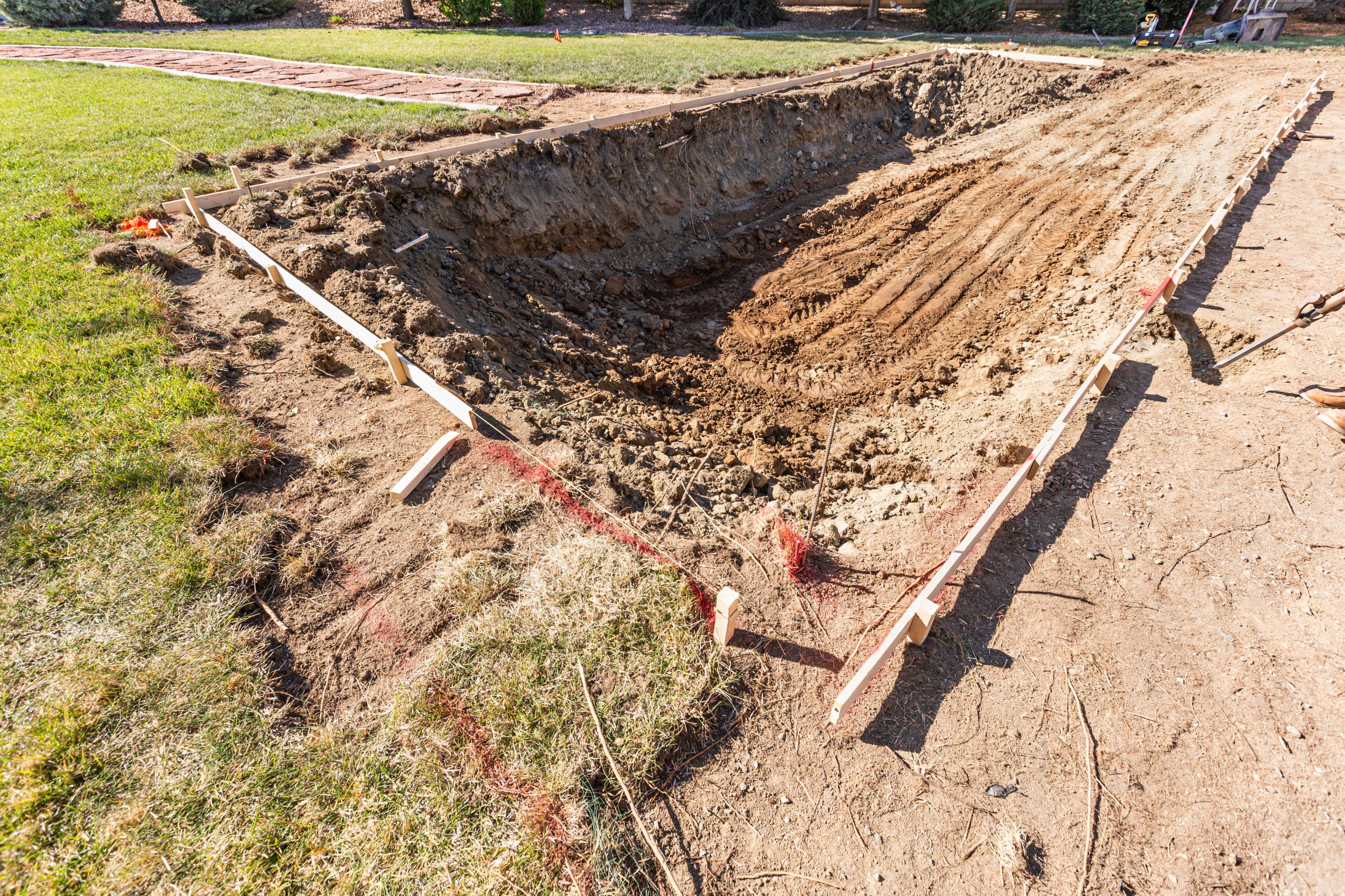 freshly dug hole in yard preparing for swimming po 2026 03 09 03 25 59 utc freshly dug hole in yard preparing for swimming po 2026 03 09 03 25 59 utc